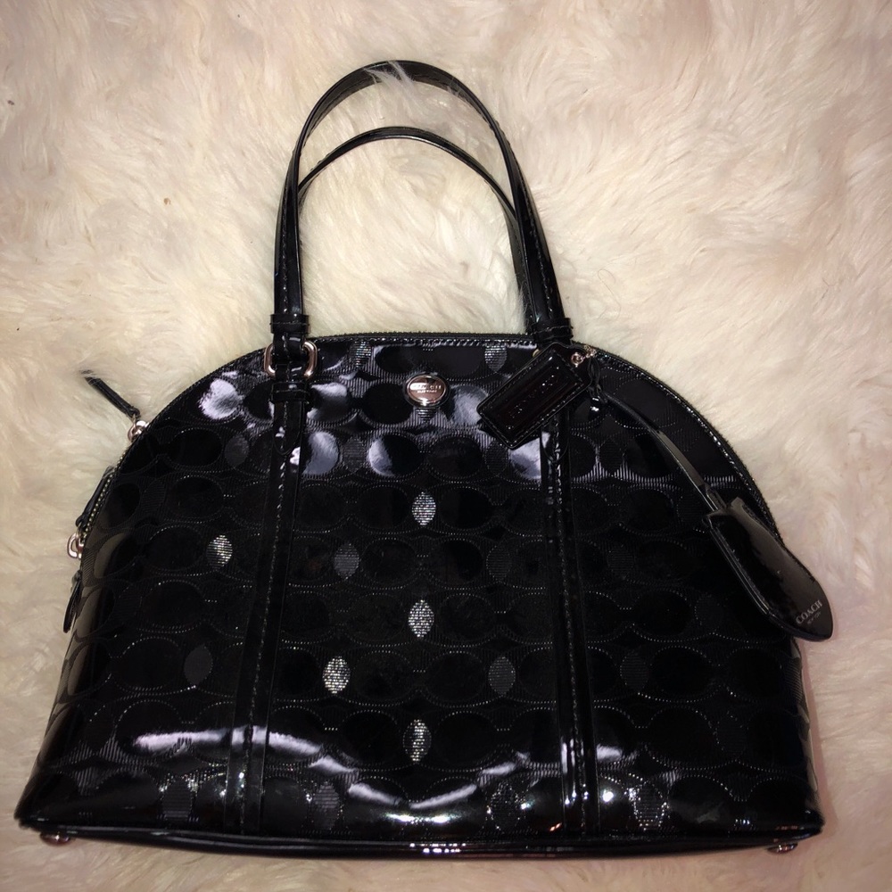 Coach logo handbag.